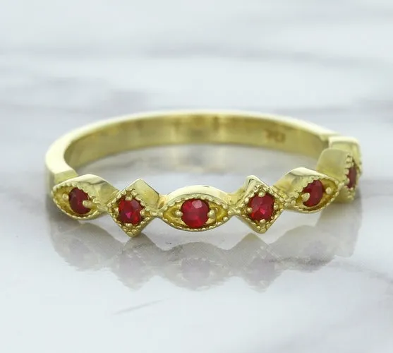 0.20ctw Ruby Alternating Marquise Ring in 14K Yellow Gold