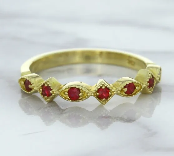 0.20ctw Ruby Alternating Marquise Ring in 14K Yellow Gold