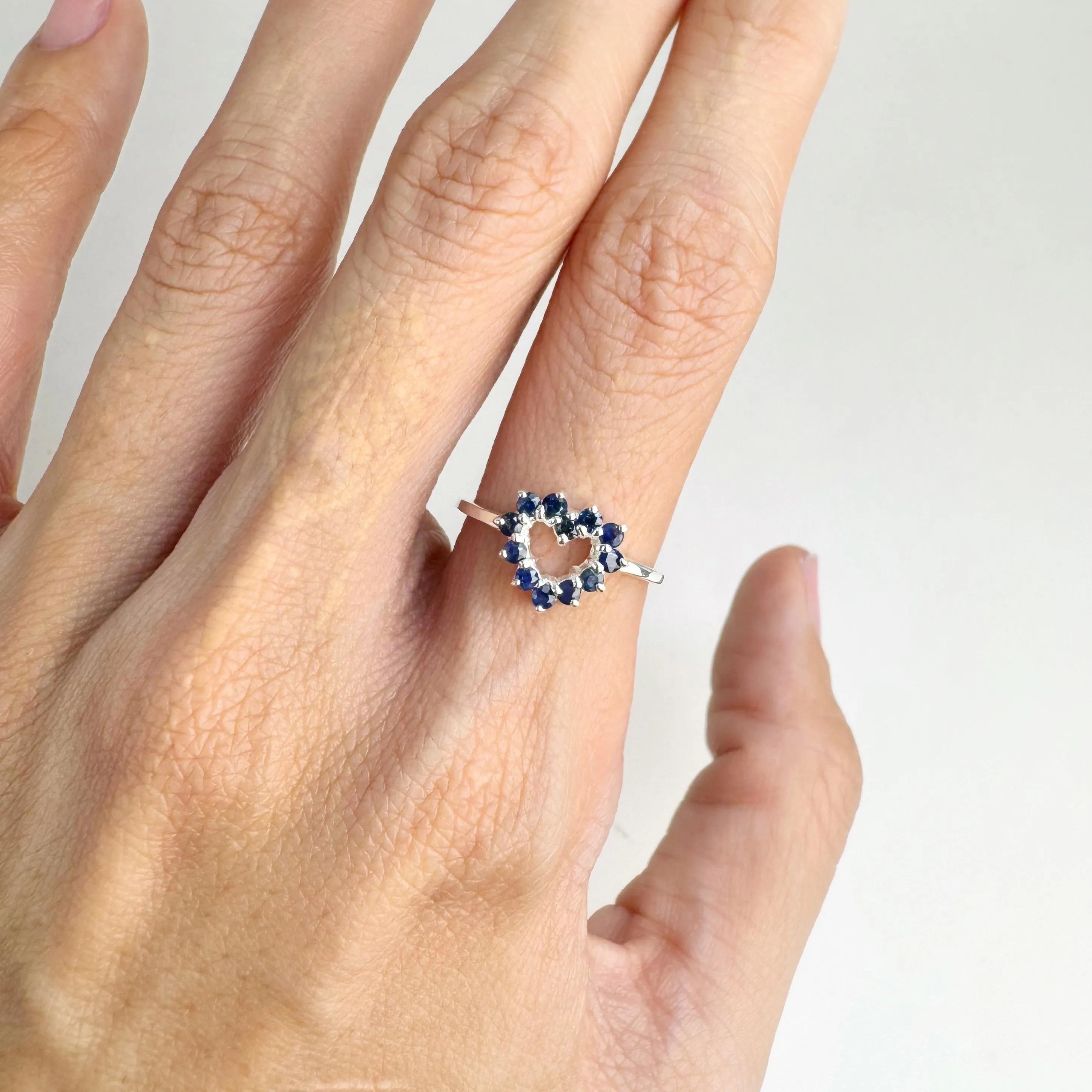 2 mm. Round Cut Blue Thai Sapphire Heart Ring (Blemished)