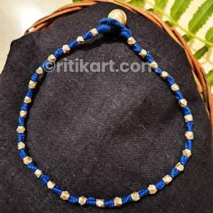 Ancient Anklet with Brass Beads Embedded in Blue Thread