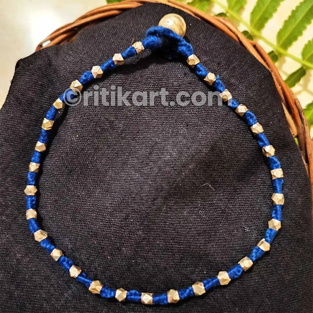 Ancient Anklet with Brass Beads Embedded in Blue Thread