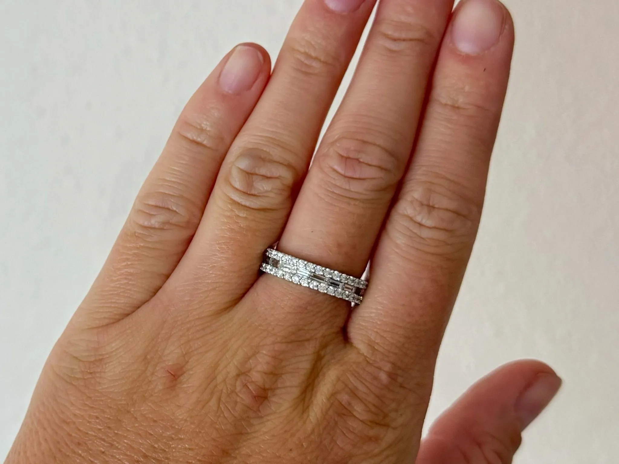 Baguette Diamond Center with Brilliant Cut Diamond Bands 18k White Gold