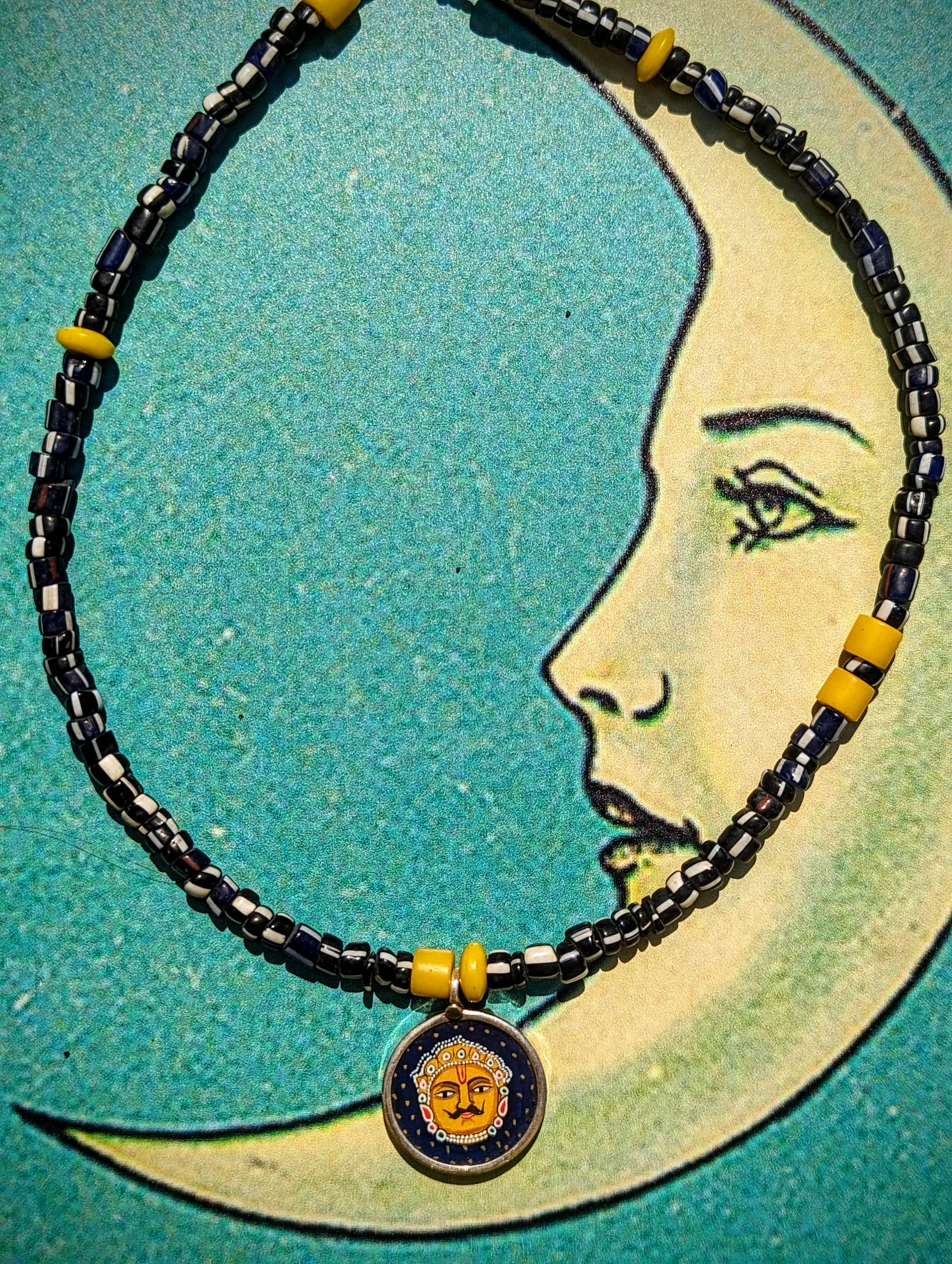 Celestial trade beads with hand painted silver pendants