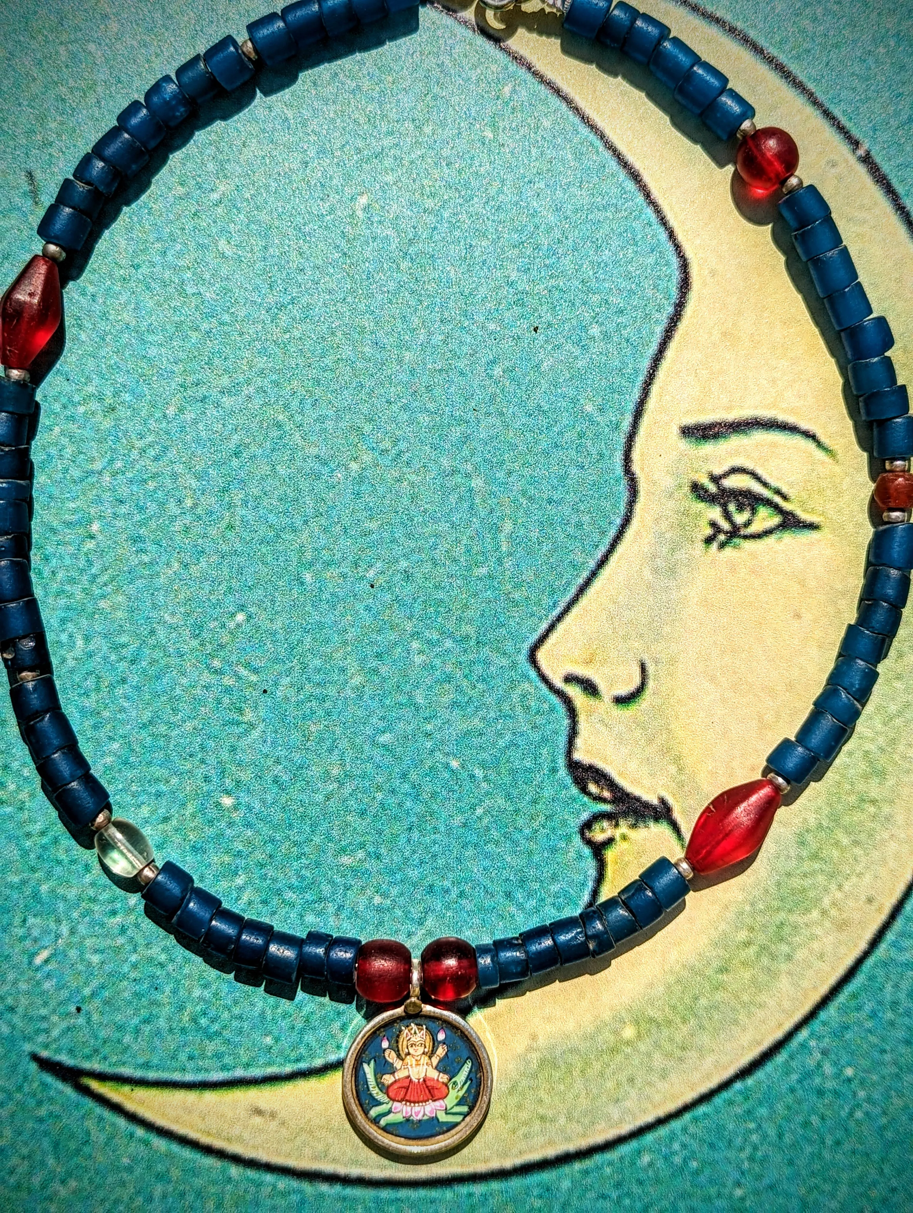 Celestial trade beads with hand painted silver pendants