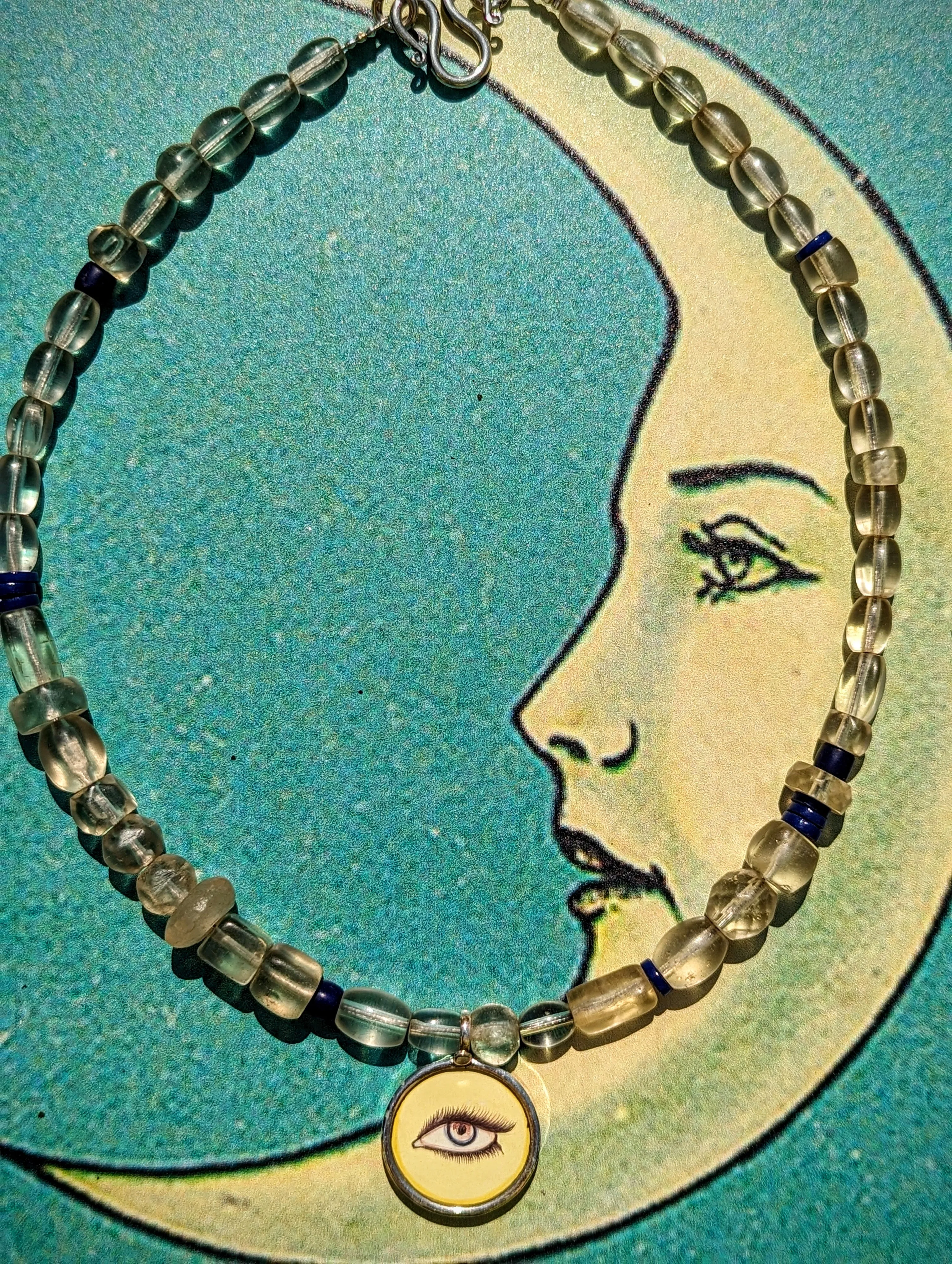 Celestial trade beads with hand painted silver pendants