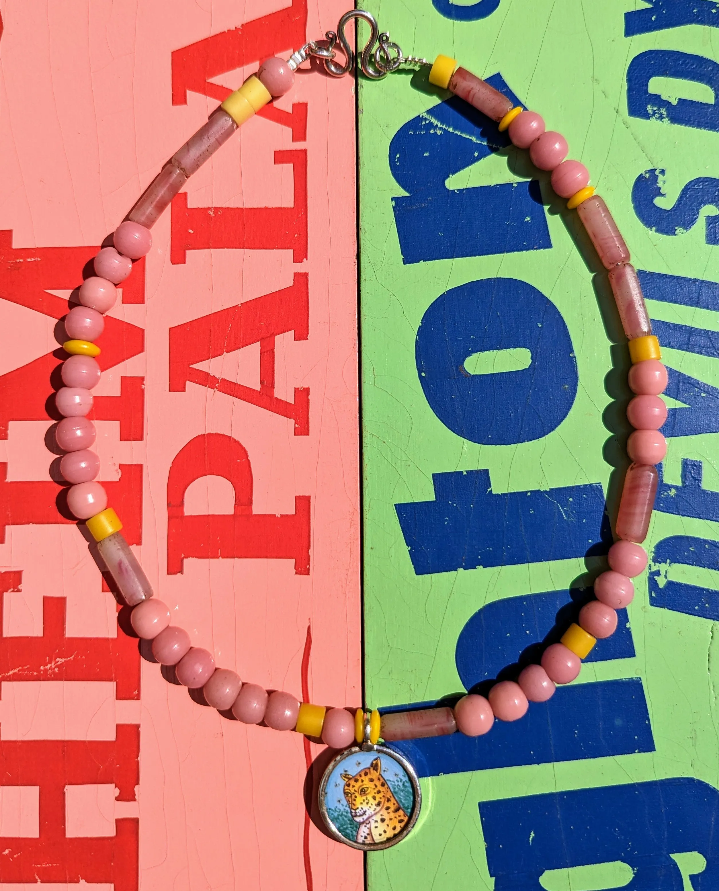 Pastel trade beads with hand painted silver pendants