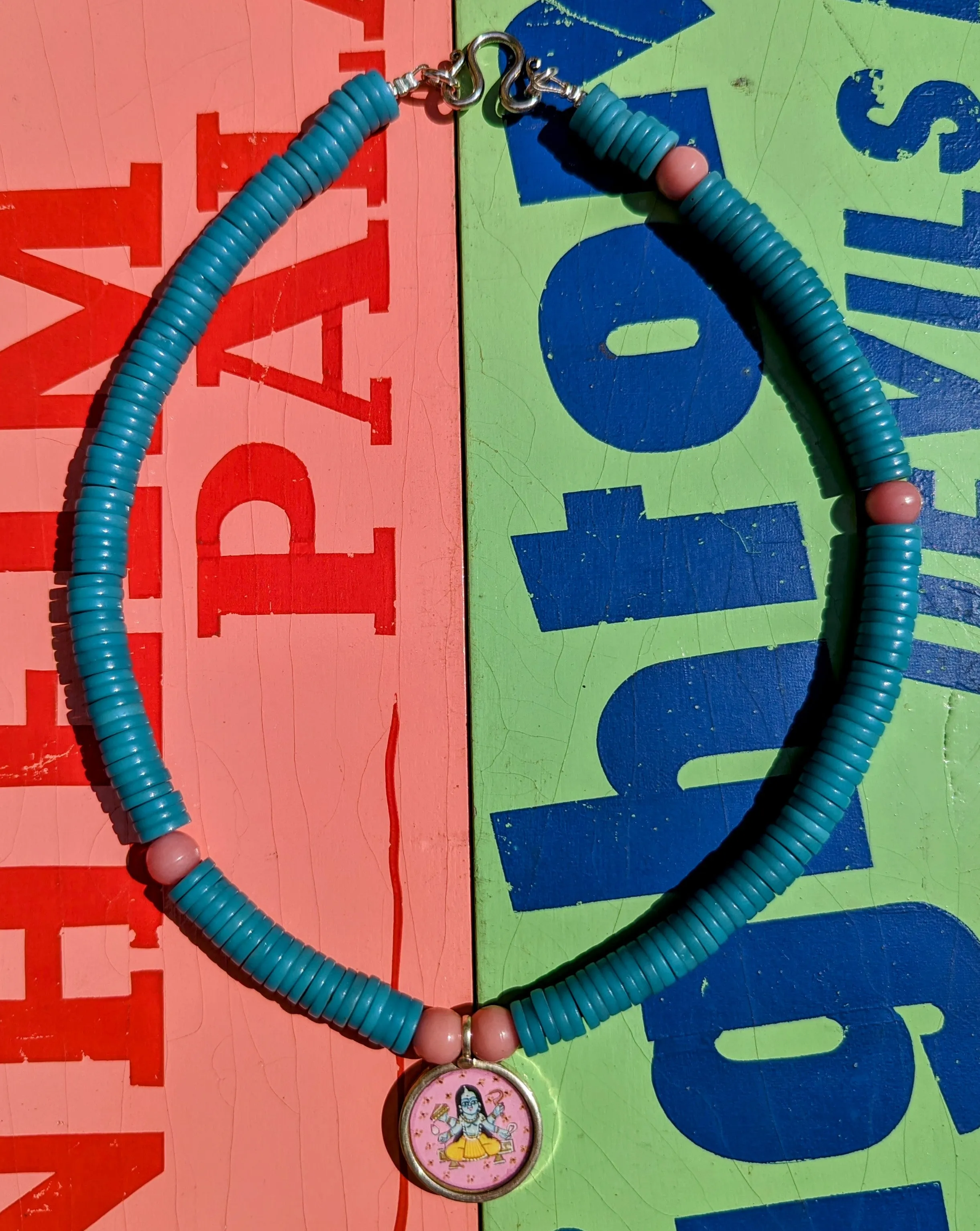 Pastel trade beads with hand painted silver pendants
