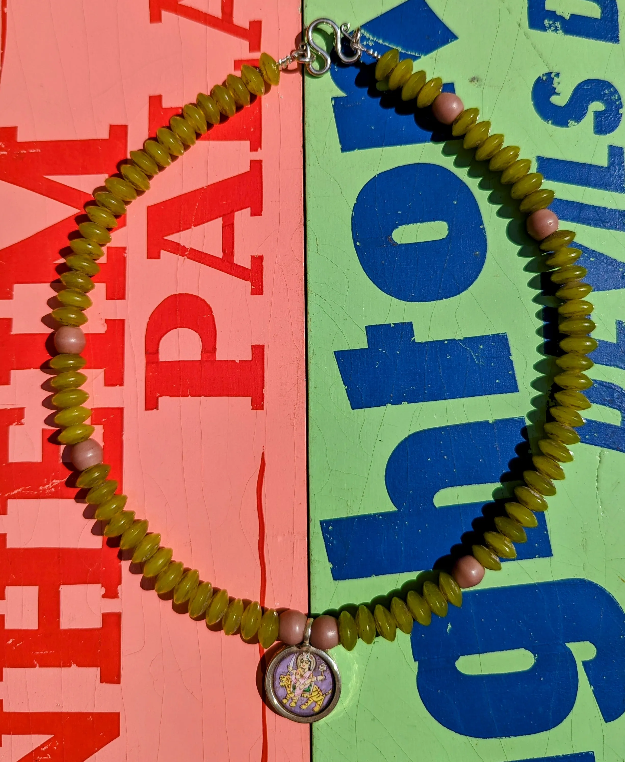 Pastel trade beads with hand painted silver pendants