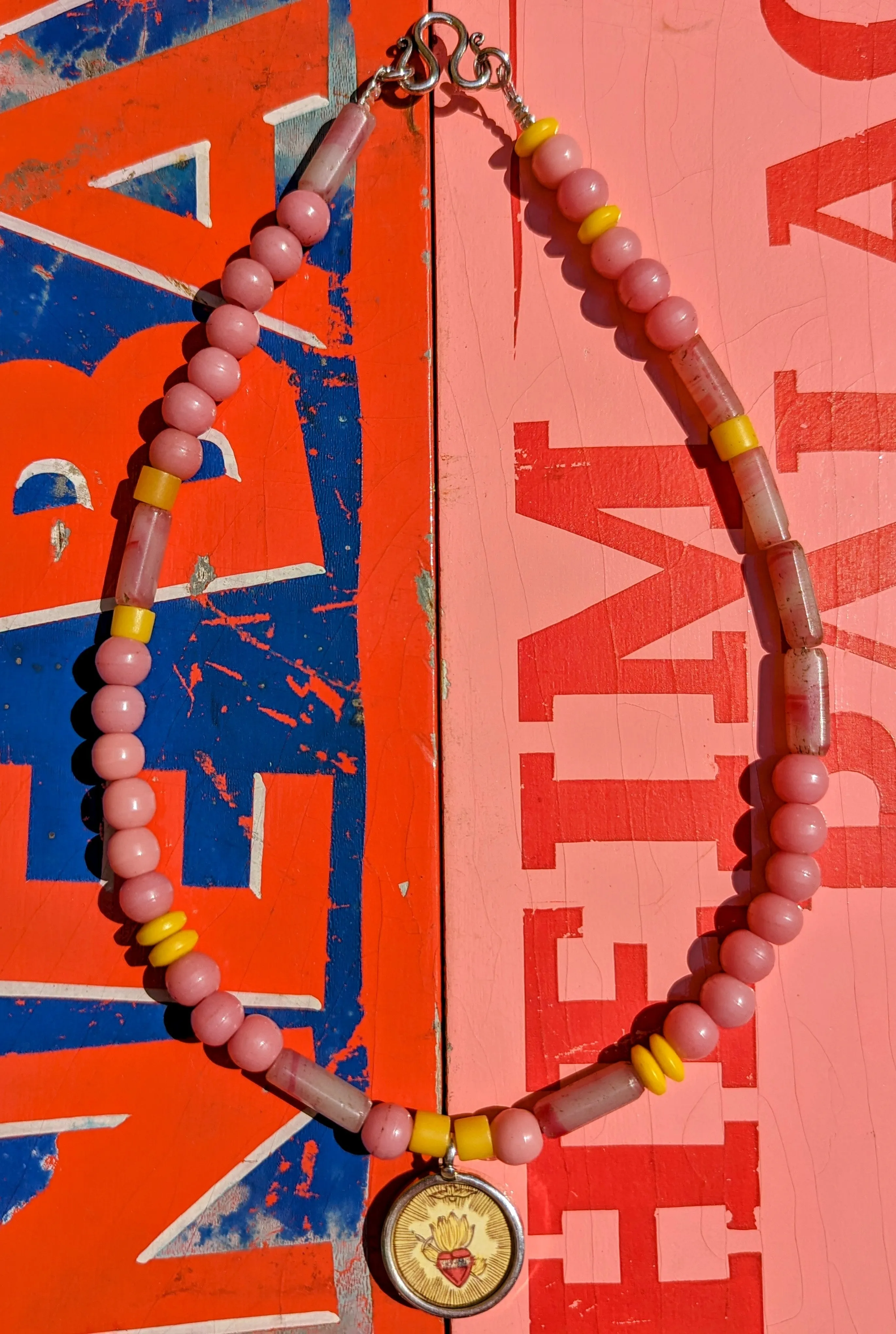 Pastel trade beads with hand painted silver pendants