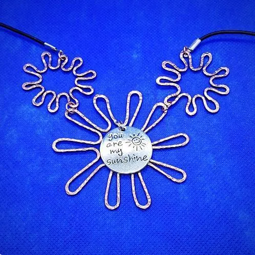 Solid Copper Sunflower Pendant Necklace with Silver "You Are My Sunshine" Charm – Black Leather Rope