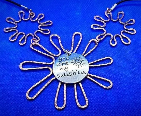 Solid Copper Sunflower Pendant Necklace with Silver "You Are My Sunshine" Charm – Black Leather Rope