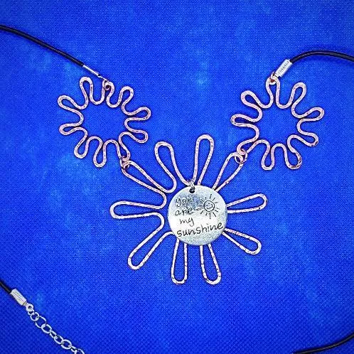 Solid Copper Sunflower Pendant Necklace with Silver "You Are My Sunshine" Charm – Black Leather Rope