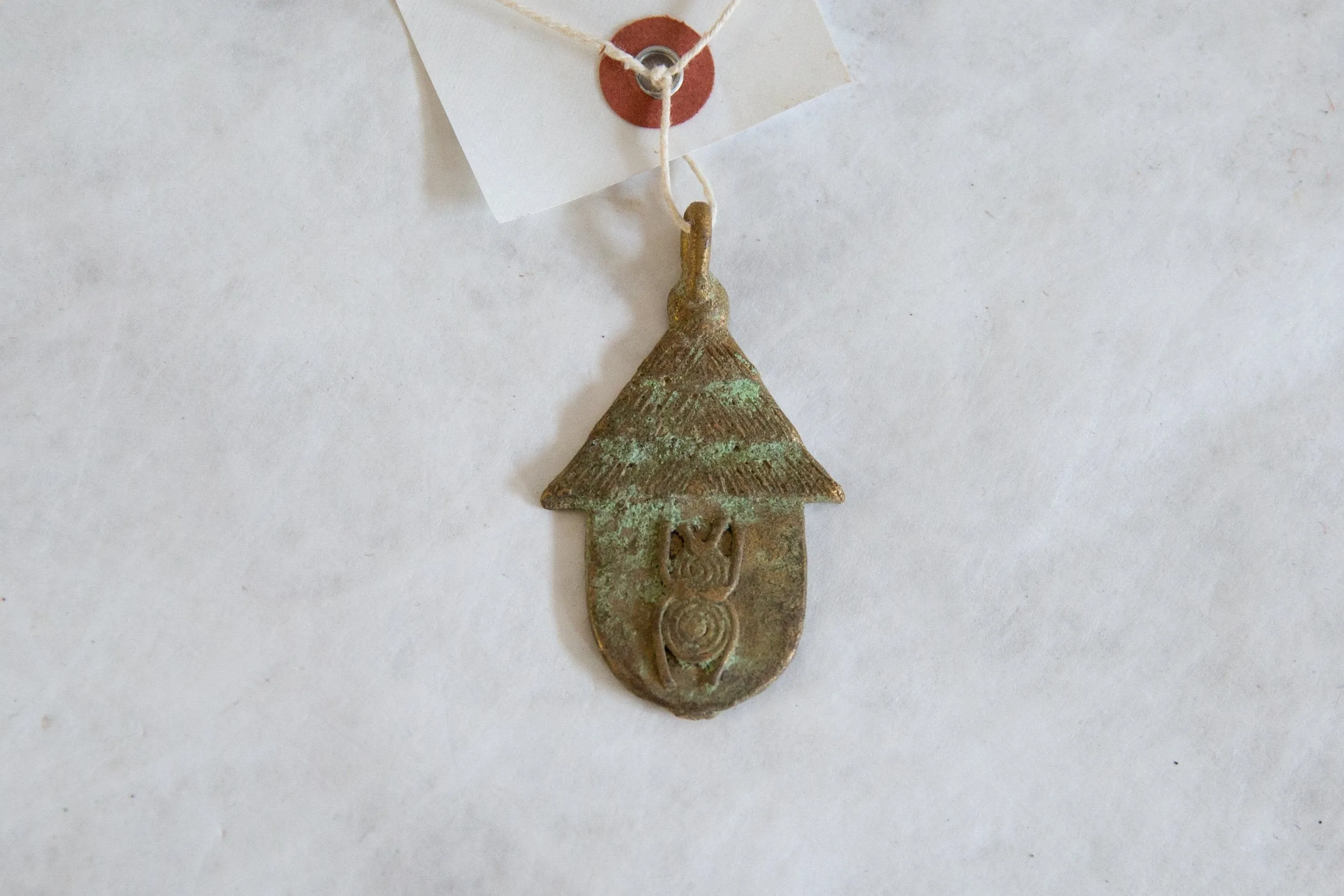 Vintage African Oxidized Bronze Hut with Bug Design Pendant