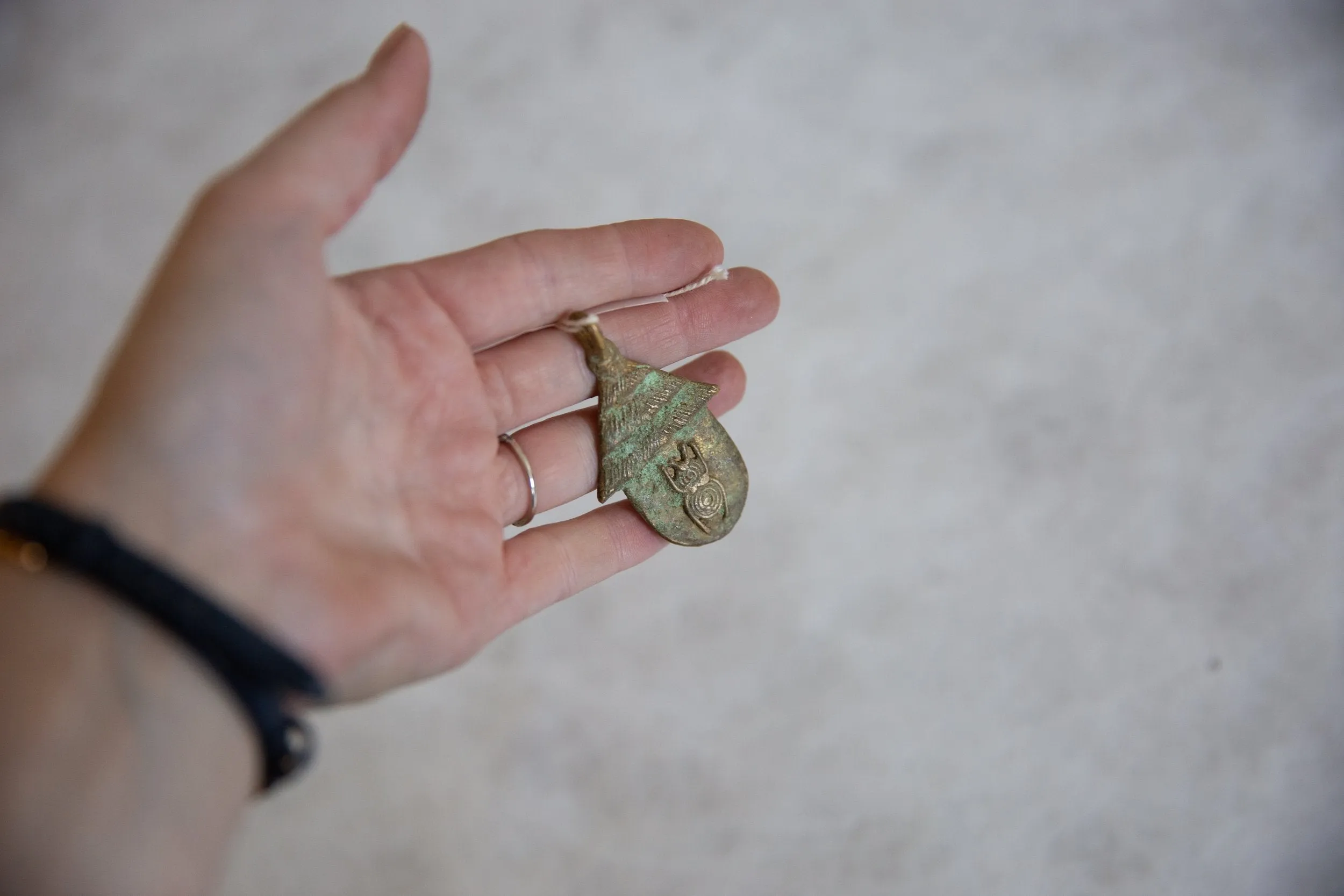 Vintage African Oxidized Bronze Hut with Bug Design Pendant