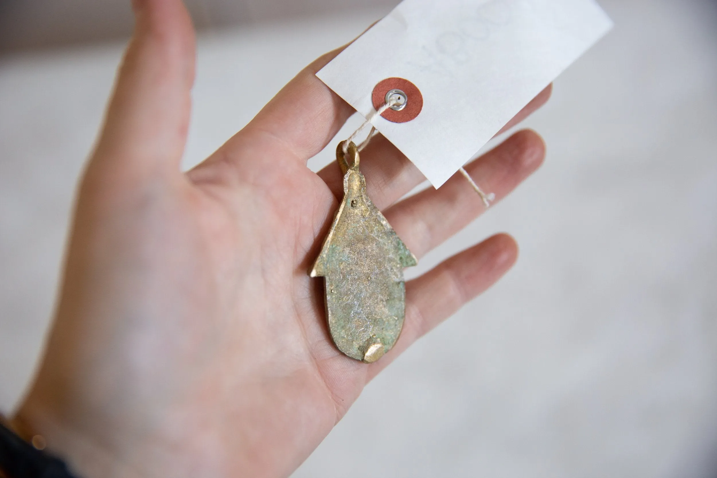 Vintage African Oxidized Bronze Hut with Bug Design Pendant